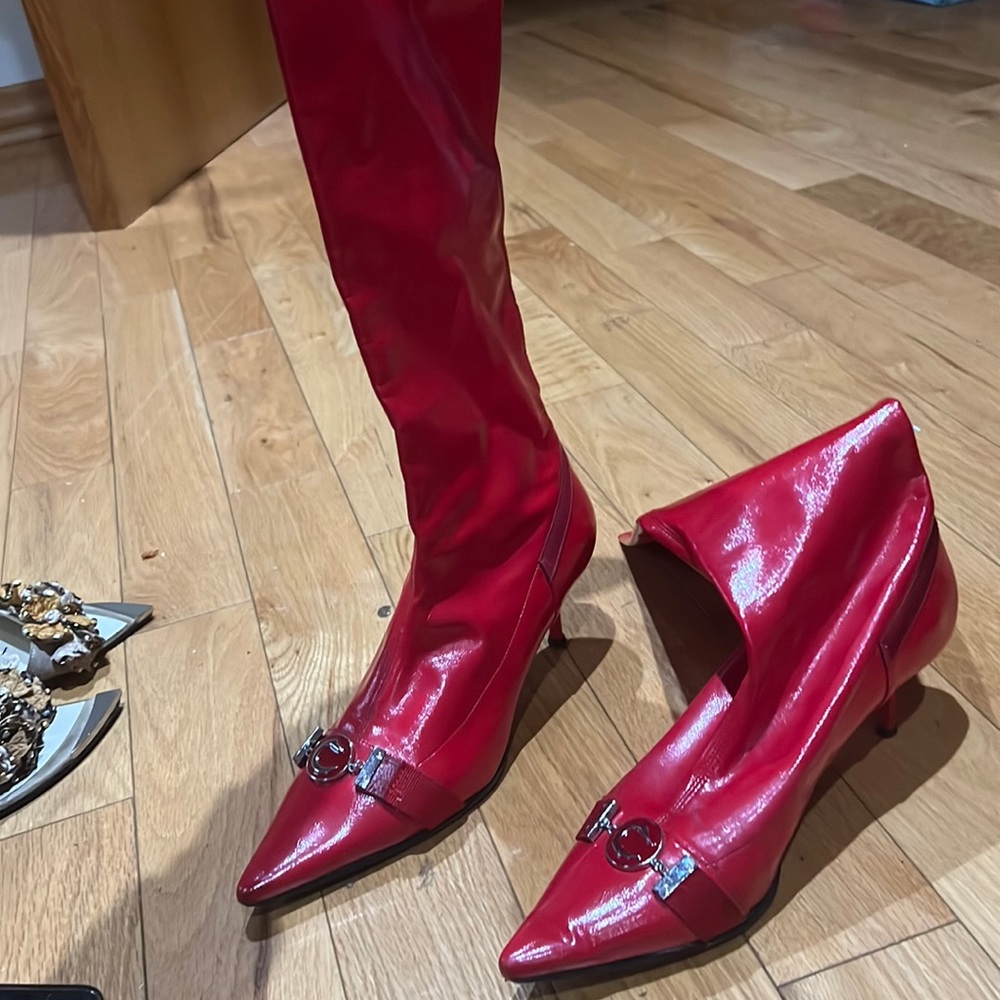 Red knee length boots